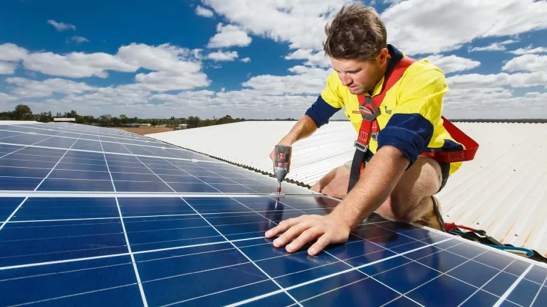 Content creation by Admedia showcasing a Lee & Golding electrician installing solar panels on a rooftop, highlighting their renewable energy services.