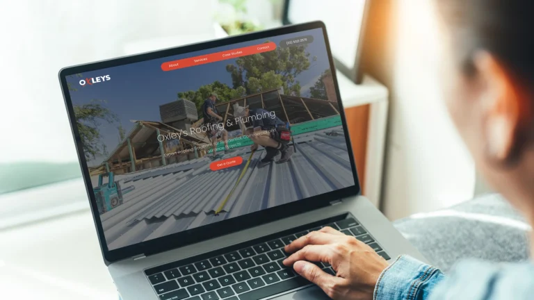 Website design Mildura case study on laptop screen showing Oxley's completed web development project